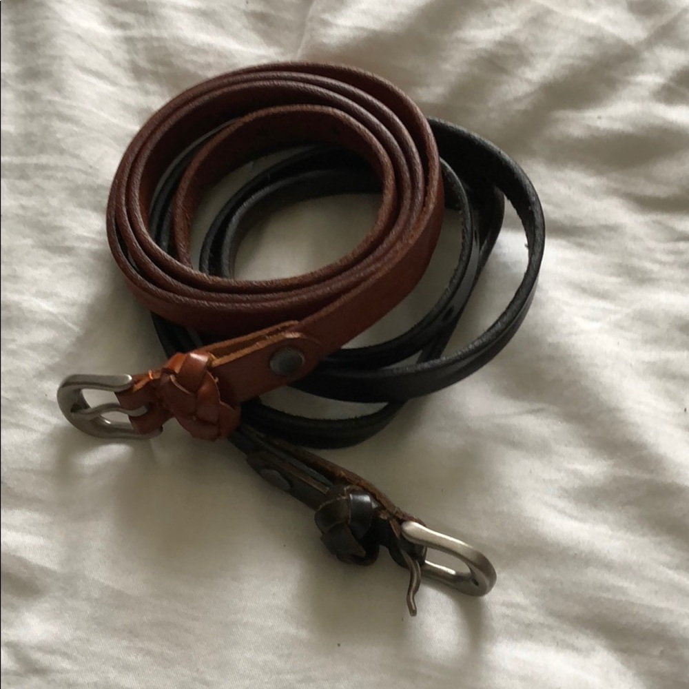 Pair of leather belts.